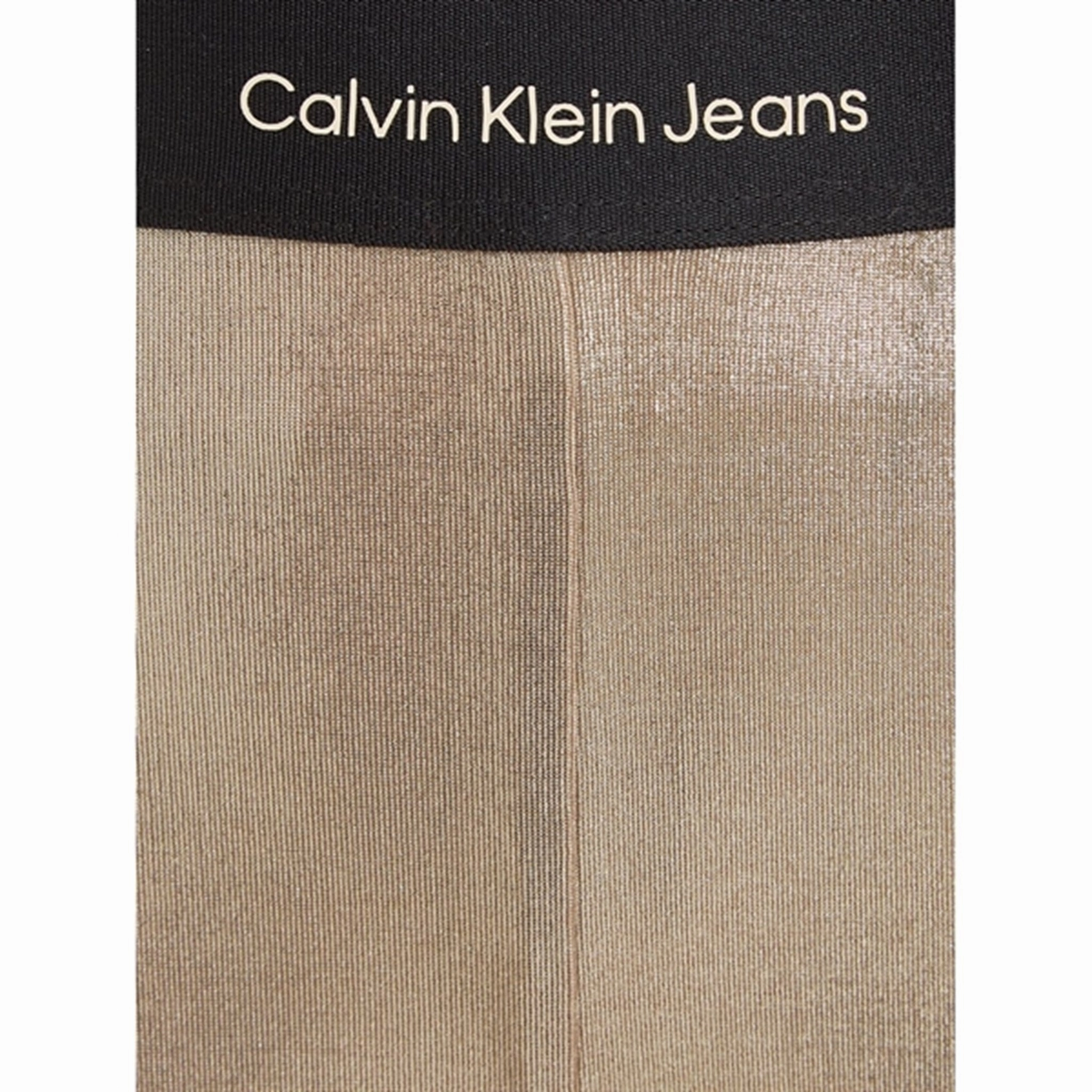 All Ages Stretch Fit sleek contour Calvin Klein Metallic Coated Leggings Frosted Almond