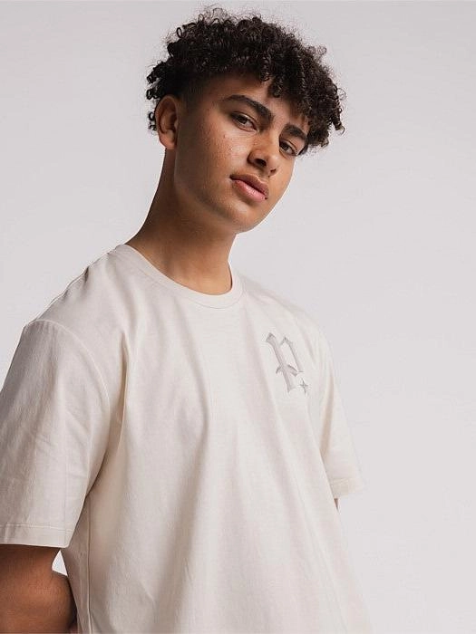 Chrome Track Tee in Off White Date night