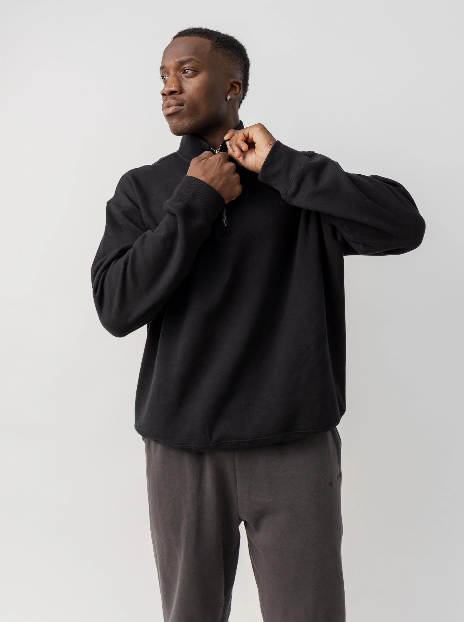 Quarter Zip in Solid Black City Mood Wear Stain Protection