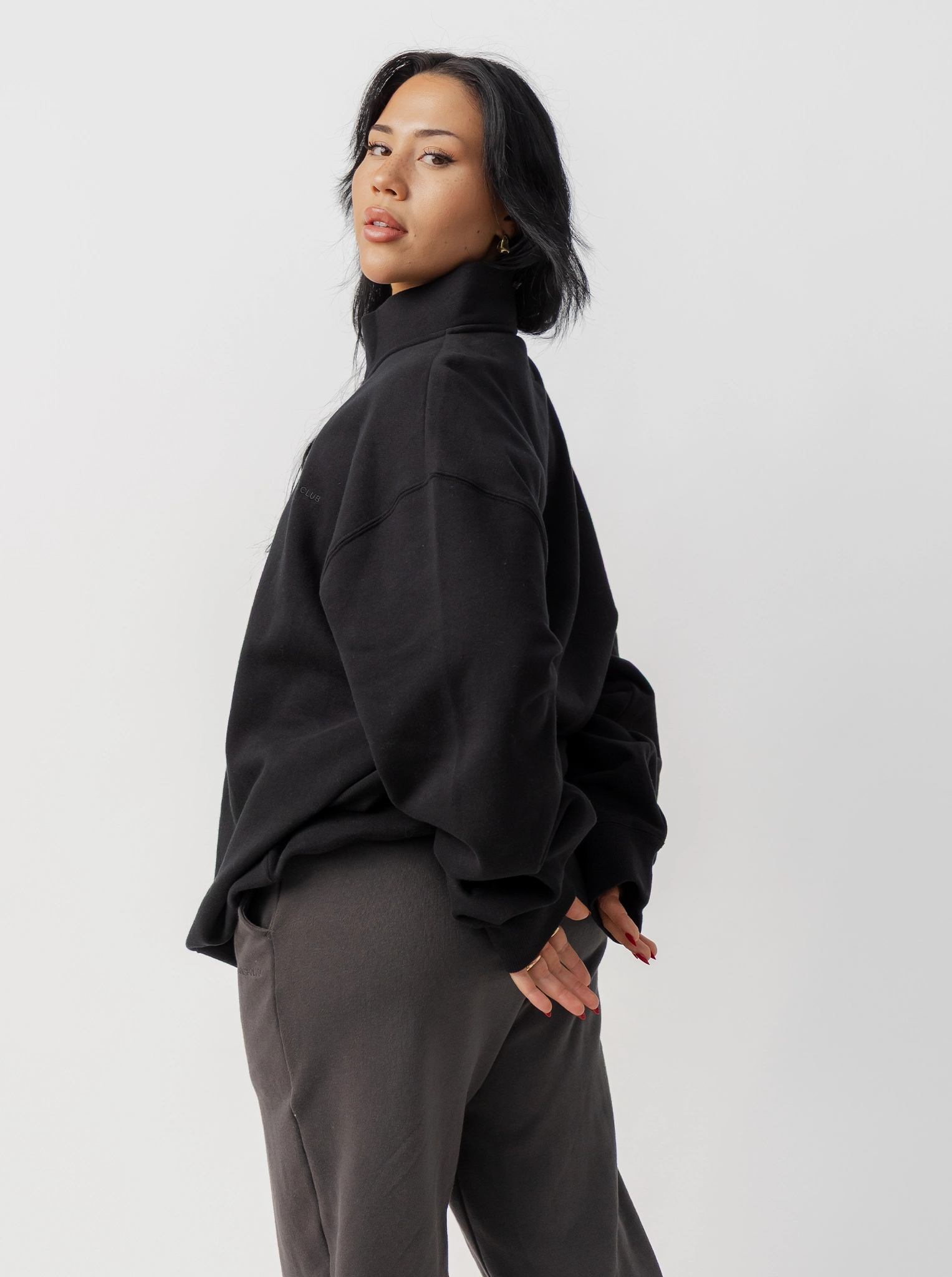 Quarter Zip in Solid Black Trend Motion