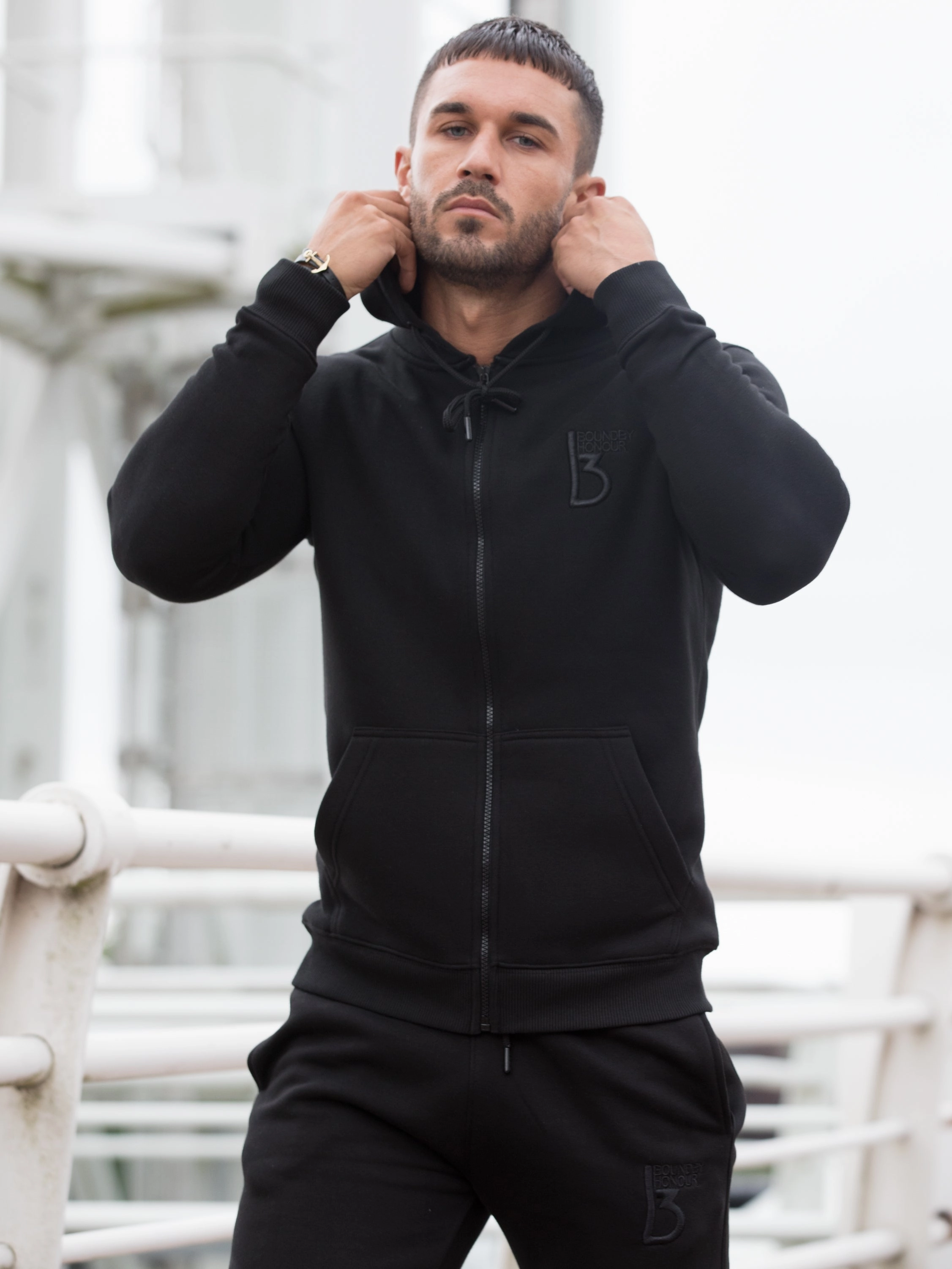 Scale Zipped Tracksuit Hood | Bound By Honour Rib Knit Hem